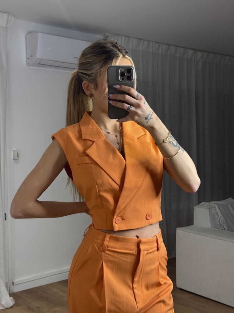 Veste sans manches orange - French Retailers